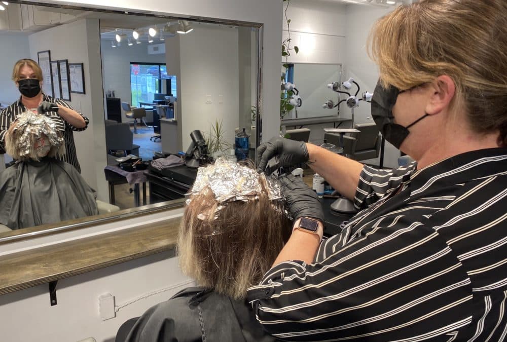 Nashville stylist Betsy Briggs Cathcart was trained to recognize signs of domestic violence and give out information about where victims can find help. (Natasha Senjanovic/WPLN)