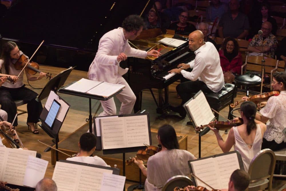 The Knights, led by conductor Eric Jacobsen, with guest pianist Aaron Diehl. (Courtesy Hilary Scott)