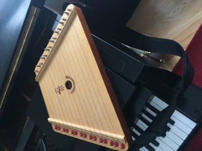 The harp-like gusli is the oldest East Slavic multi-string plucked instrument. (Photo courtesy of Rebecca Sheir)