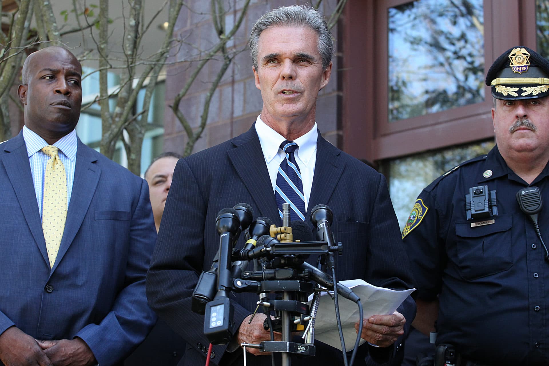 Worcester County District Attorney Joseph D. Early Jr., center, holds a press conference in 2018. (Suzanne Kreiter/The Boston Globe via Getty Images)