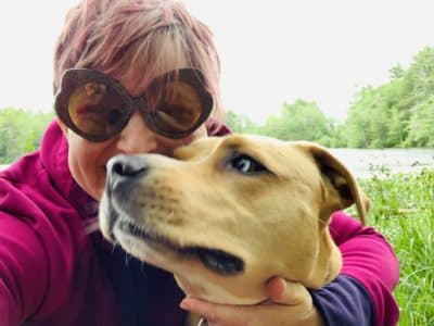 The author and her dog, Schuyler, at summer camp. (Courtesy Kendra Stanton Lee)