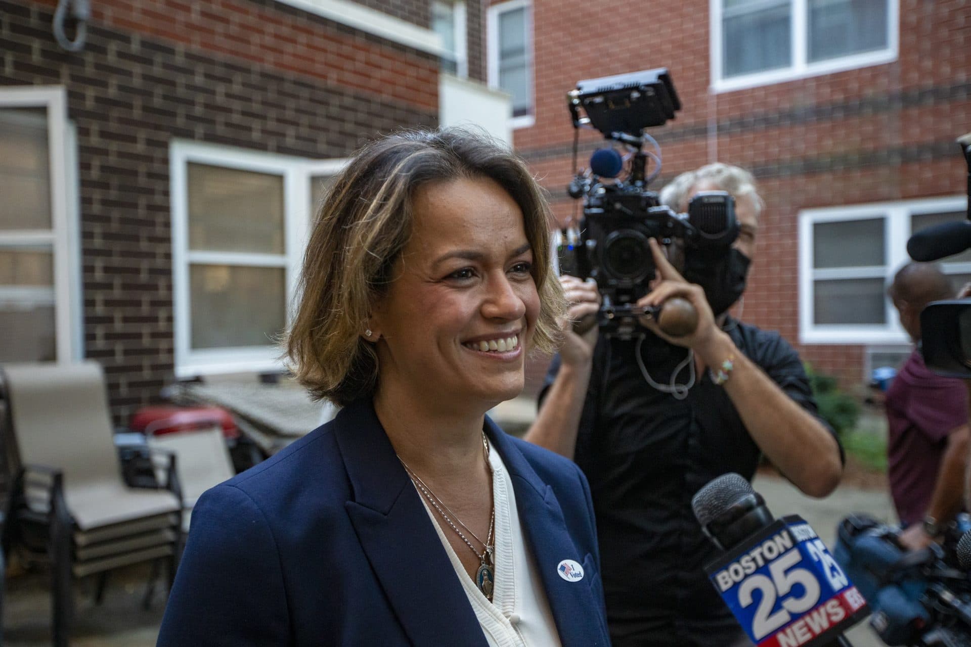 Annissa Essaibi George speaks to the news media outside of the Bellflower Apartments where she voted Tuesday morning. (Jesse Costa/WBUR)