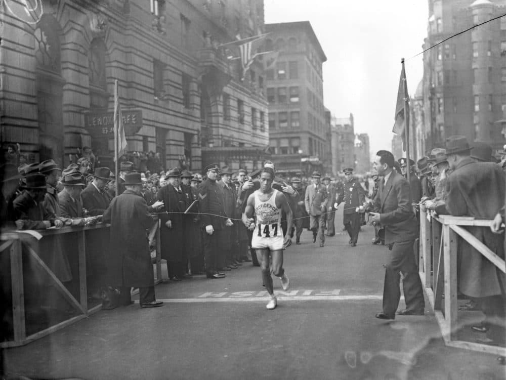 Ellison M. "Tarzan" Brown, a 22-year-old a member of Rhode Island's Narragansett tribe, breaks the tape to win the 1936 Boston Marathon. (File photo/AP)