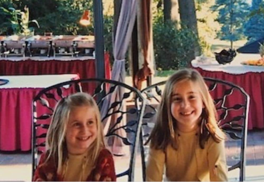 Lindsay (left) and Sophia Cook at a memorial benefit for their father, Dennis Cook, who was killed on Sept. 11, 2001. (Courtesy Lindsay Cook)