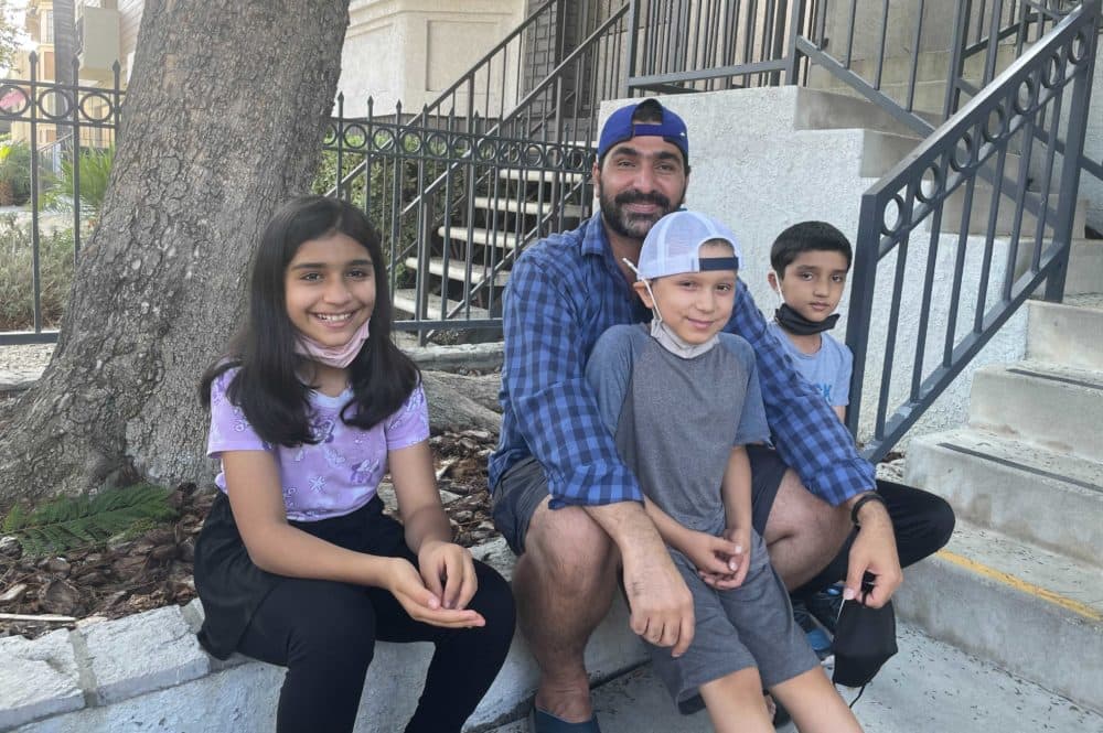 Wahidullah Asghary lives in Burbank, Calif., and is a program enrollment coordinator for Miry’s List. He is pictured with his children from left to right: Mina, Musawir and Mudasir. They left Afghanistan in 2020 as refugees for their new home in the U.S. (Tonya Mosley/Here & Now)