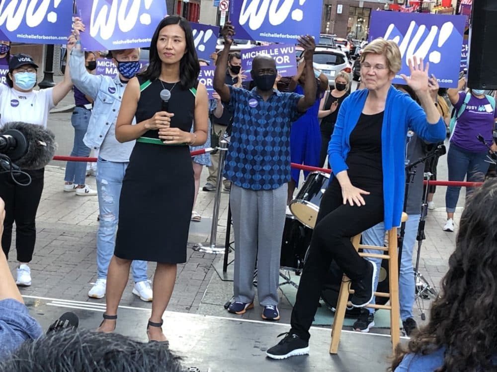 City councilor and mayoral candidate Michelle Wu was joined by Sen. Elizabeth Warren at a rally in Chinatown on Saturday. (Anthony Brooks/WBUR)