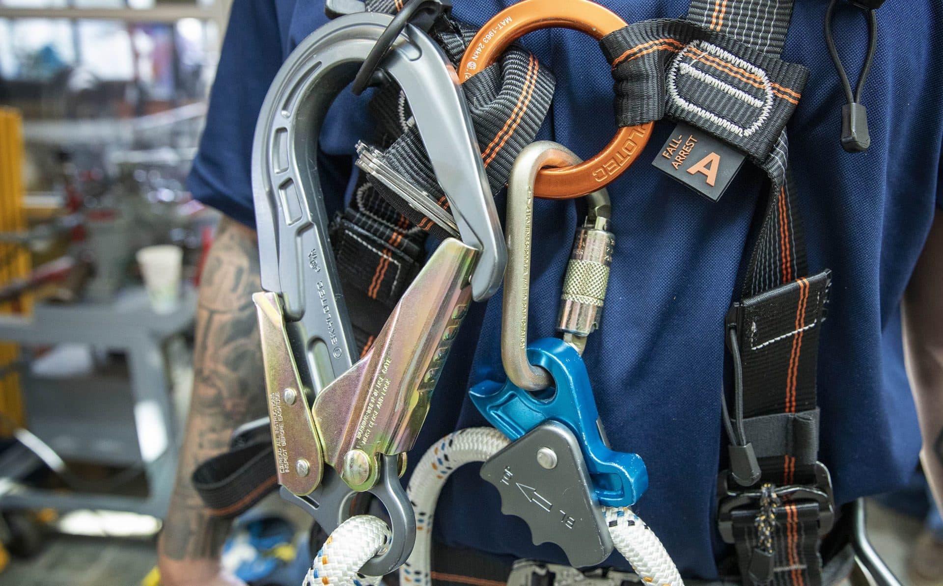 A trainee wears a harness loaded with safety gear during the Working At Heights training course. (Robin Lubbock/WBUR)