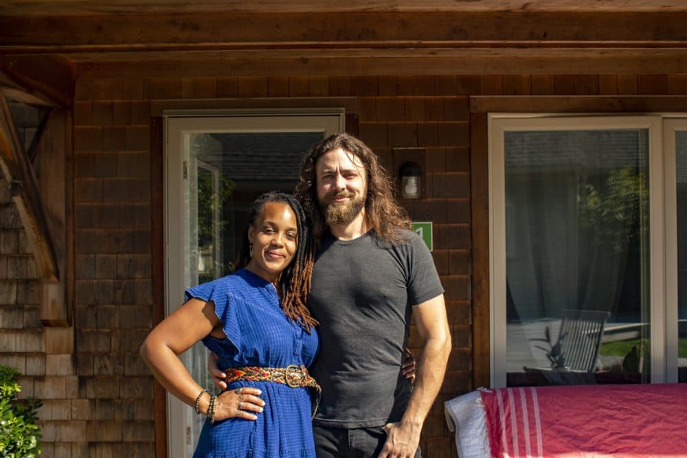 Arielle Faria, pictured here with her husband, Augusto Faria, is an administrator at the Edgartown Affordable Housing Committee. (Wilder Fleming/WBUR)