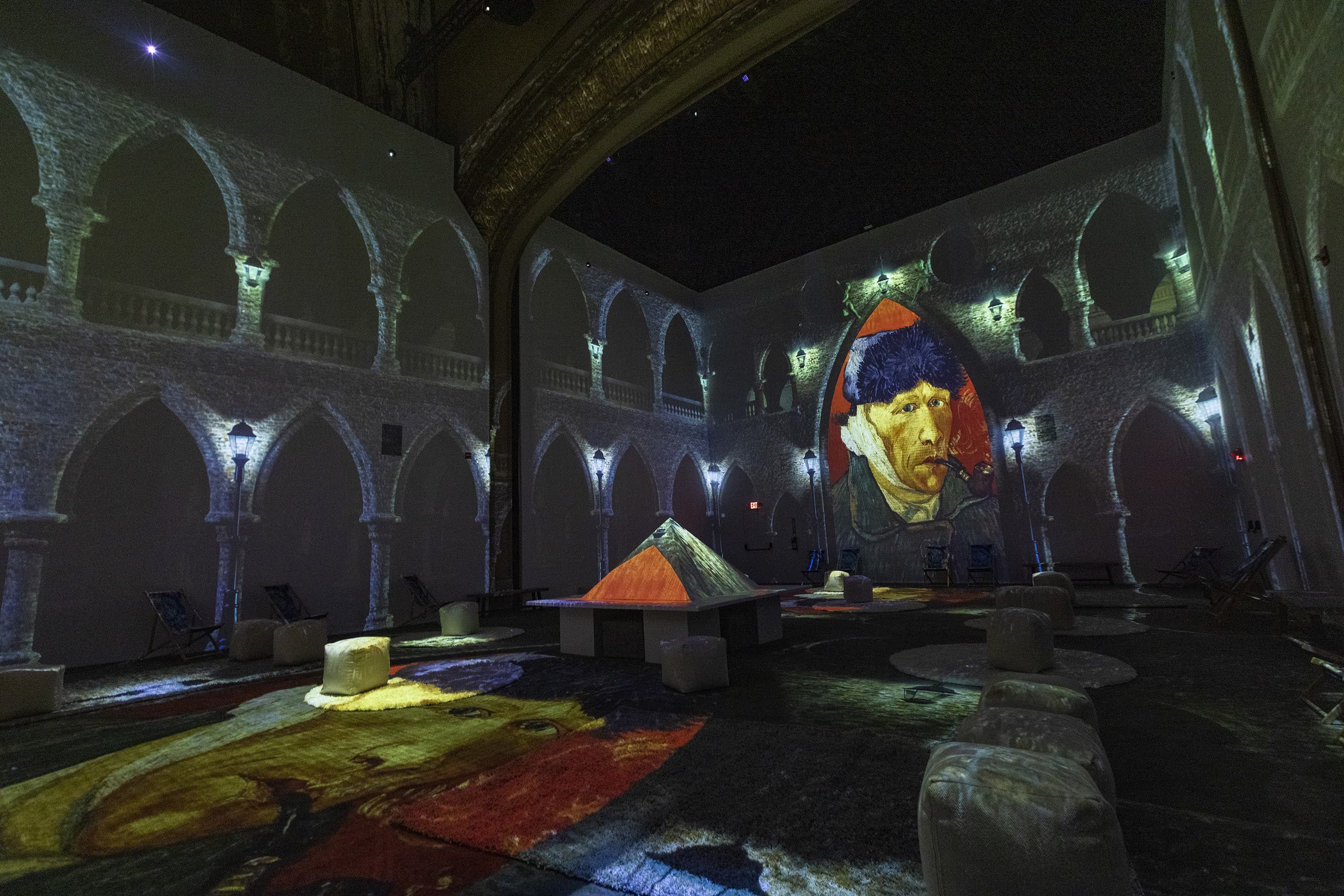 The central area in the Strand Theatre where Van Gogh’s works stretch floor-to-ceiling in an immersive light projection show. (Jesse Costa/WBUR)