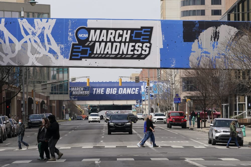 March Madness banners for the NCAA college basketball tournament cover crosswalks in Indianapolis on March 17, 2021. (Darron Cummings/AP)