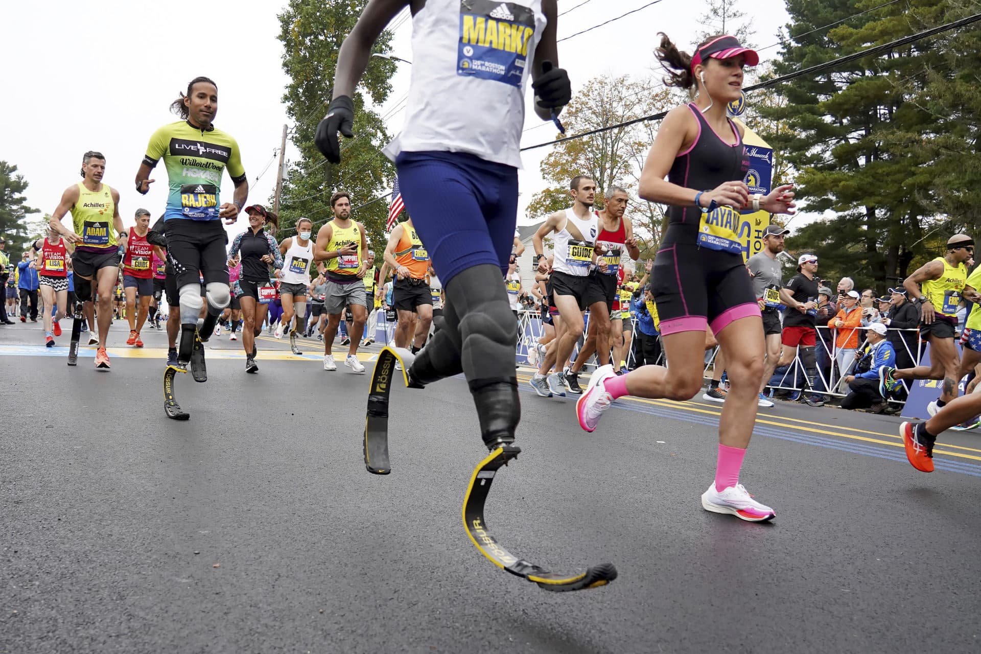 Runners head out from the starting line. (Mary Schwalm/AP)