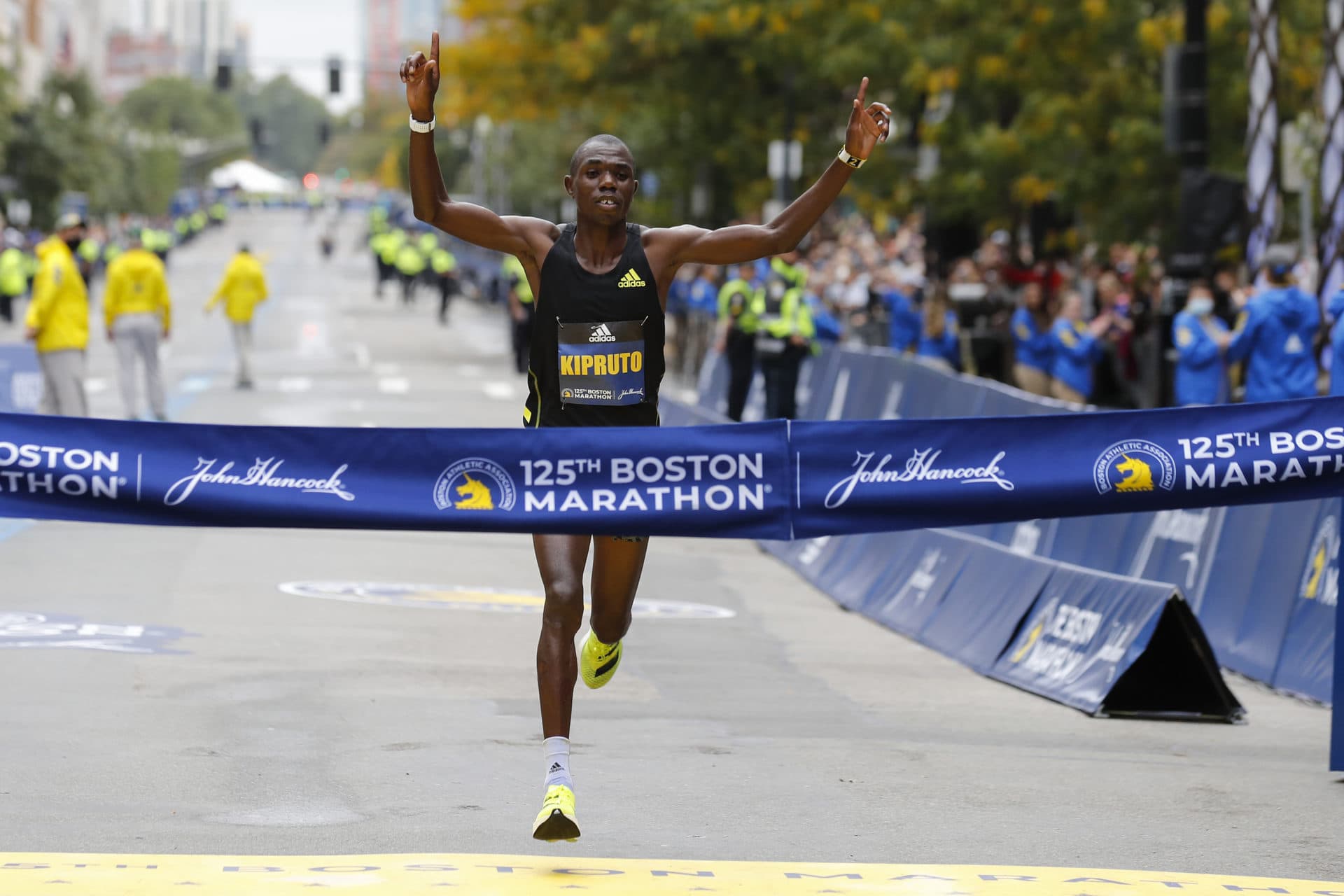 Benson Kipruto, of Kenya, approaches the tape to win the men's race of the 125th Boston Marathon. (AP Photo/Winslow Townson)