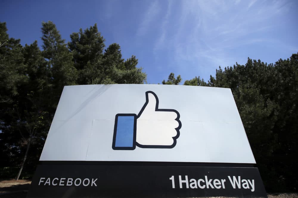 The thumbs up "Like" logo is shown on a sign at Facebook headquarters in Menlo Park, California, on April 14, 2020. (Jeff Chiu/AP)