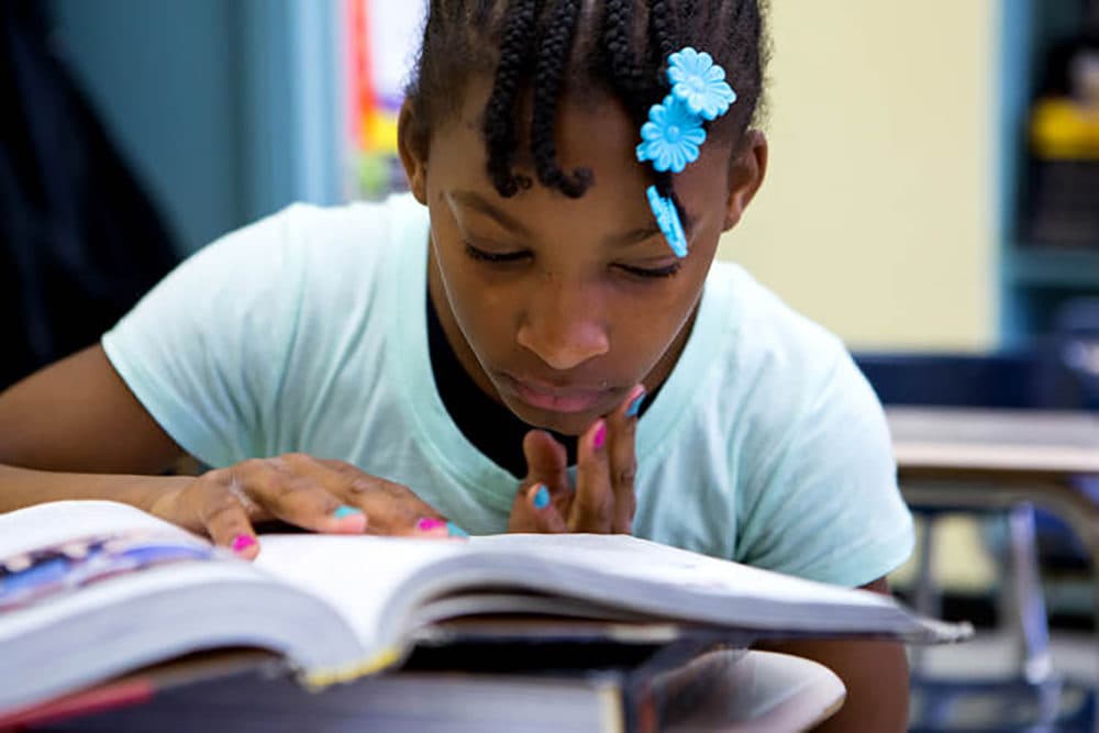A young Dasani at school. (Ruth Fremson/The New York Times)