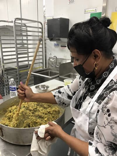 Chef Shanthini making samosas. (Karyn Miller-Medzon/Here & Now)