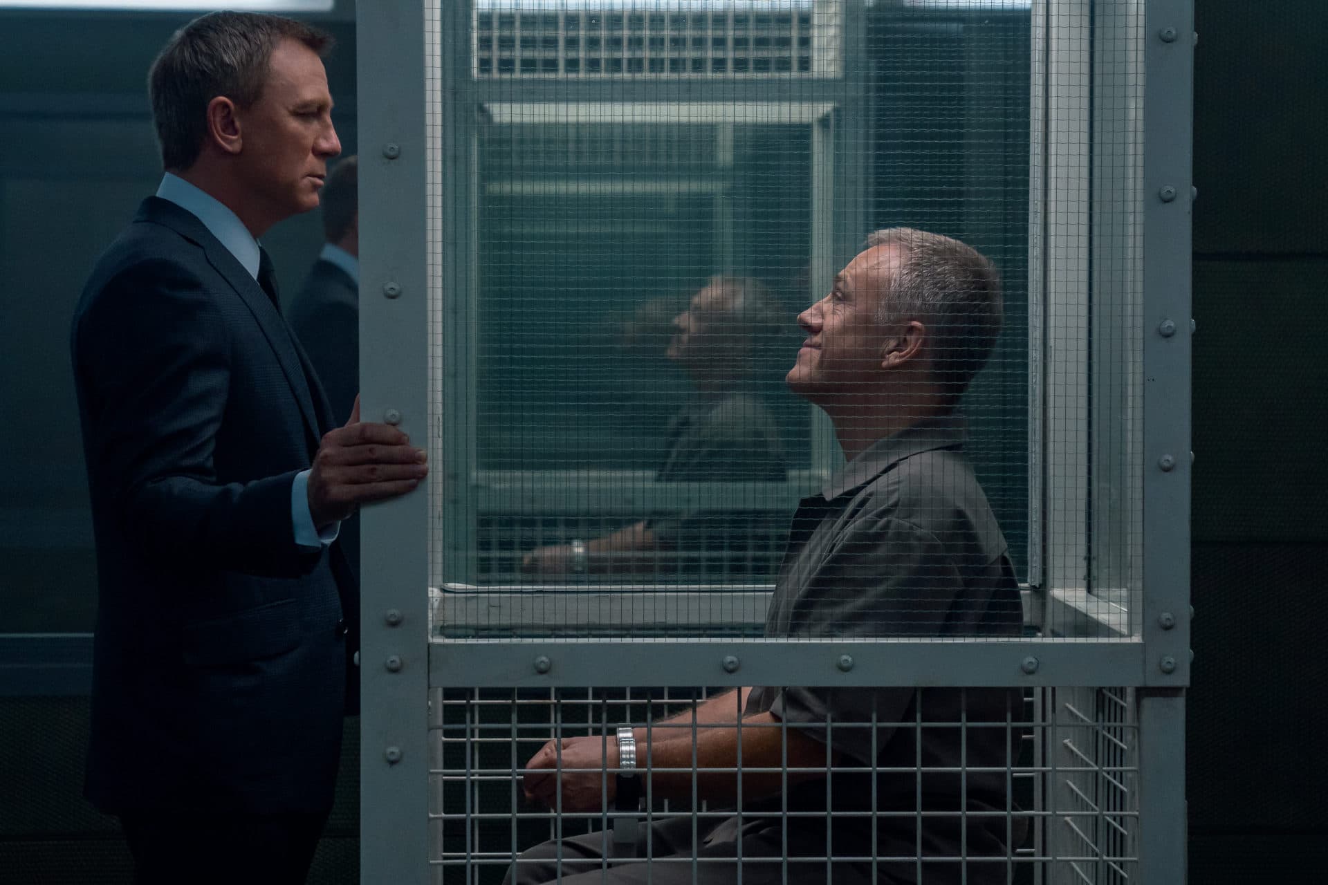 Daniel Craig as James Bond and Christoph Waltz as Blofeld in "No Time to Die." (Courtesy Nicola Dove/MGM)