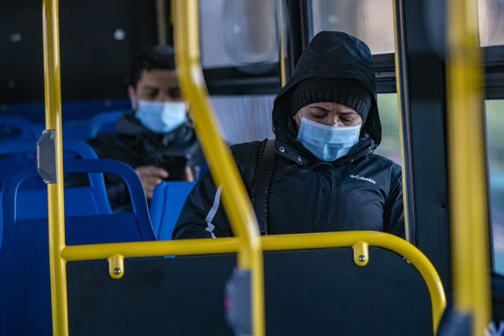 Passengers ride the MBTA bus last winter. (Jesse Costa/WBUR)