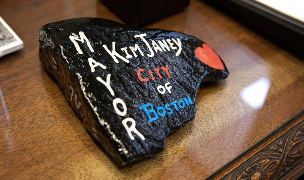 A painted rock that Kim Janey keeps on her desk at City Hall. (Robin Lubbock/WBUR)
