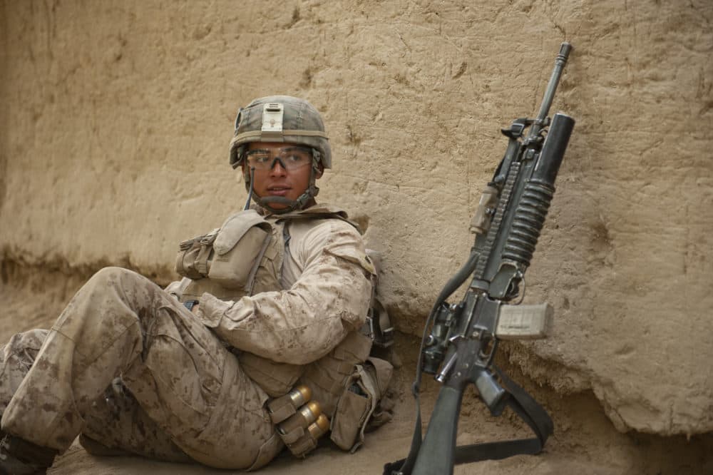 Corporal Manuel Mendoza, who served as a fire team leader in Third Squad, takes a break during a patrol in Sangin. (Elliott Woods)