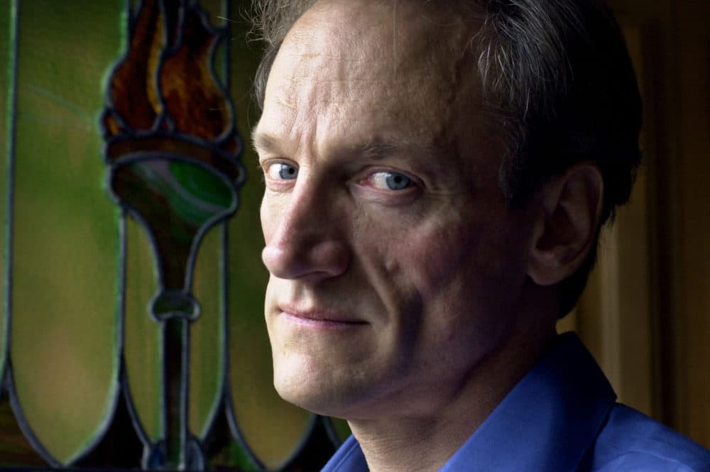 In this Feb. 15, 2002 photograph, Phil Saviano, regional coordinator for the Survivors Network for those Abused by Priests, poses for a portrait in his Boston home. (Steven Senne/AP)