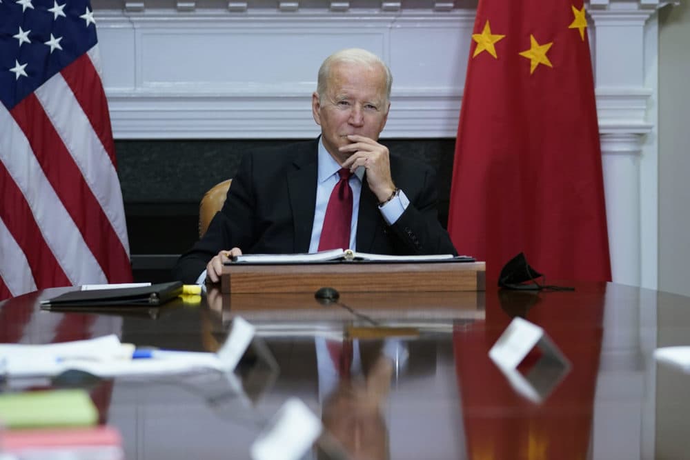 President Joe Biden listens as he meets virtually with Chinese President Xi Jinping from the Roosevelt Room of the White House in Washington. (Susan Walsh/AP Photo)
