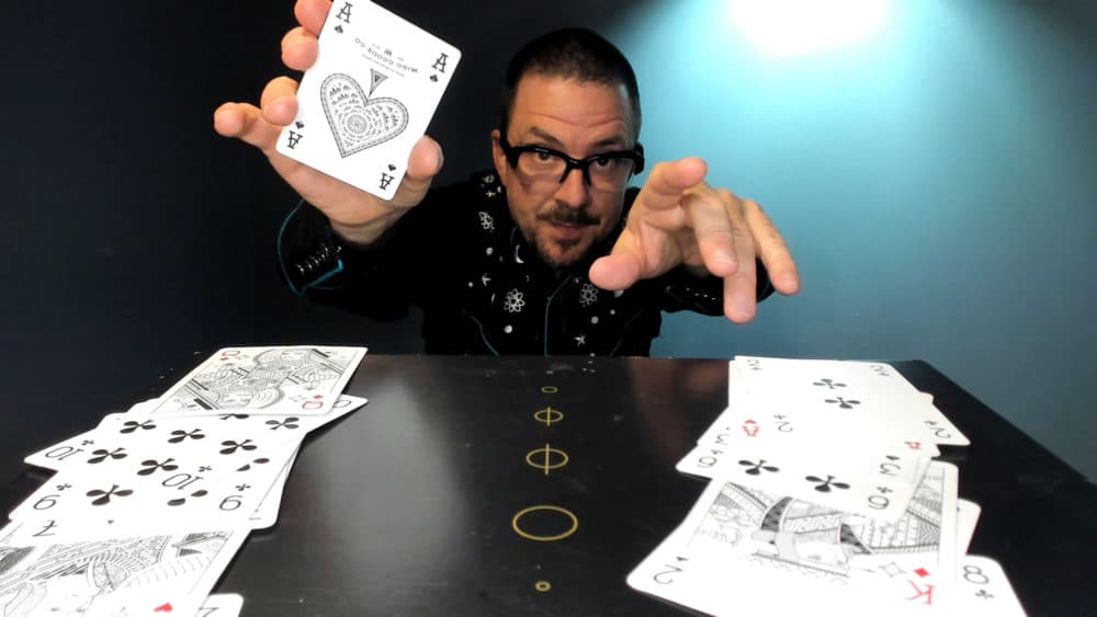 Thaddeus Phillips performs card tricks in "Zoo Motel," a digital show via ArtsEmerson. (Courtesy Rafael Esteban Phillips Mannarino)