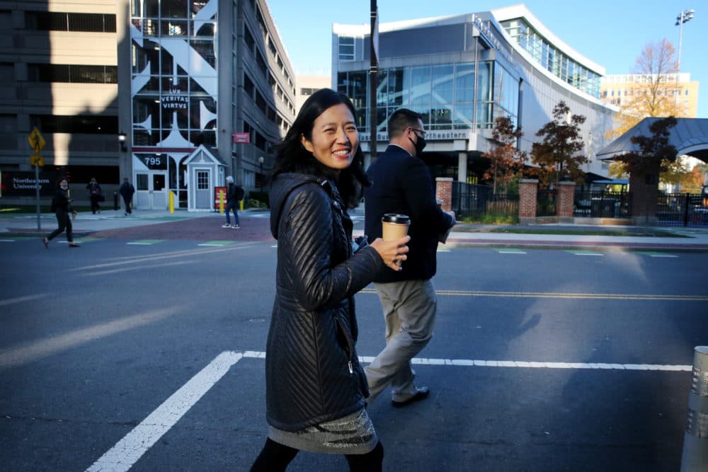 Mayor-Elect Michelle Wu departs after visiting The Underground Cafe and Lounge in Roxbury on Nov. 03. (Craig F. Walker/The Boston Globe via Getty Images)
