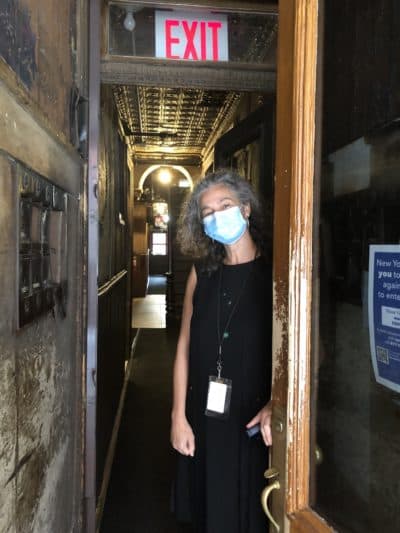 President Annie Polland inside New York's Tenement Museum. (Robin Young/Here & Now)