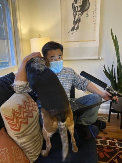 Scott Tong with Kat Chows dog, Charlie J. Bear (Charlie, for short). (Kat Chow)