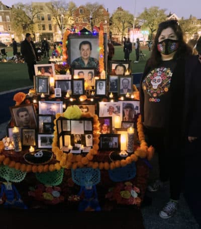 Argelia González remembers her father on the Day of the Dead. (Chris Bentley/Here & Now)