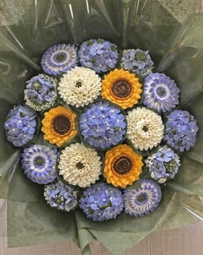 Boston Baked Blossoms founder Lisa Mackin makes cupcake arrangements that look like floral bouquets. (Courtesy Boston Baked Blossoms)