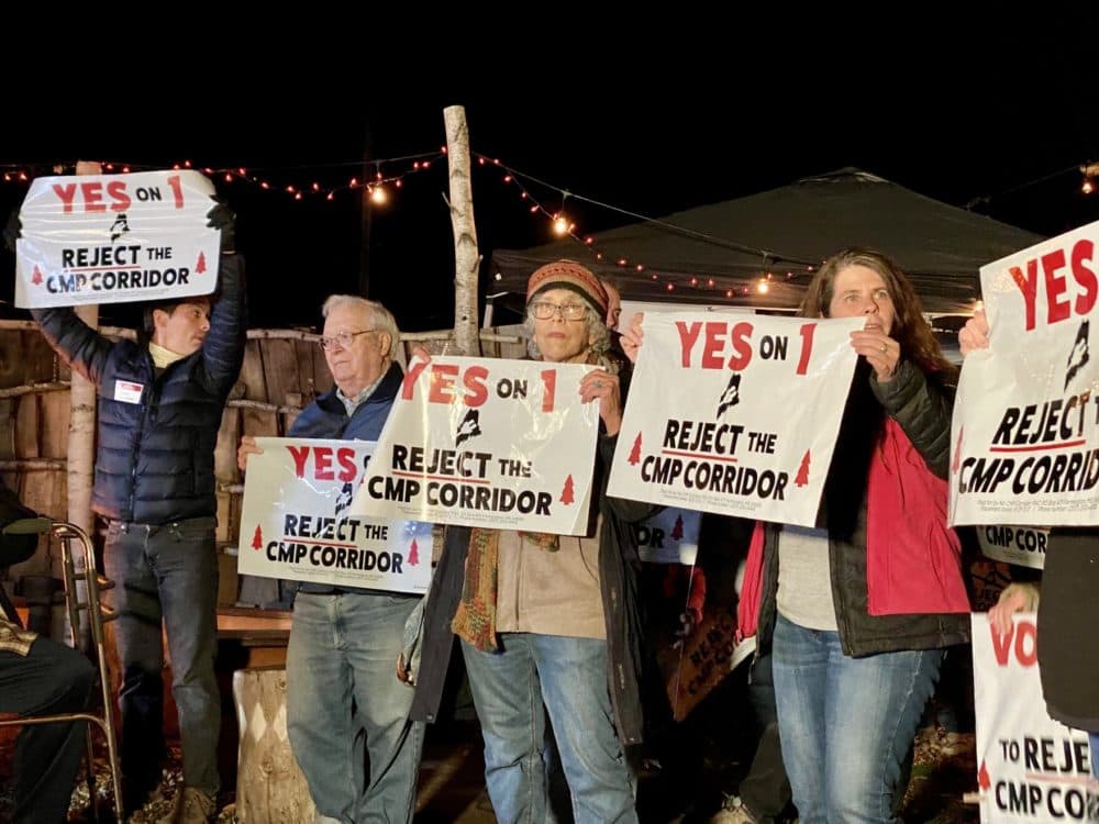 Supporters of Yes on 1 at a campaign gathering on Nov. 2, 2021. (Steve Mistler/Maine Public)