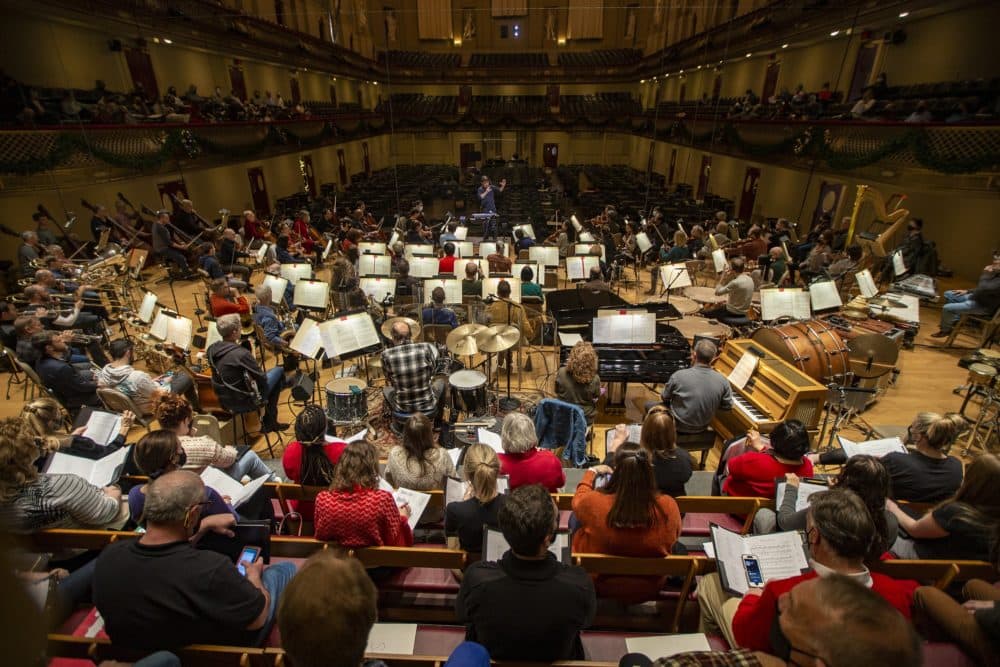 The Boston Pops conducted by Keith Lockhart during a rehearsal for the Holiday Pops concert series in early December. (Jesse Costa/WBUR)