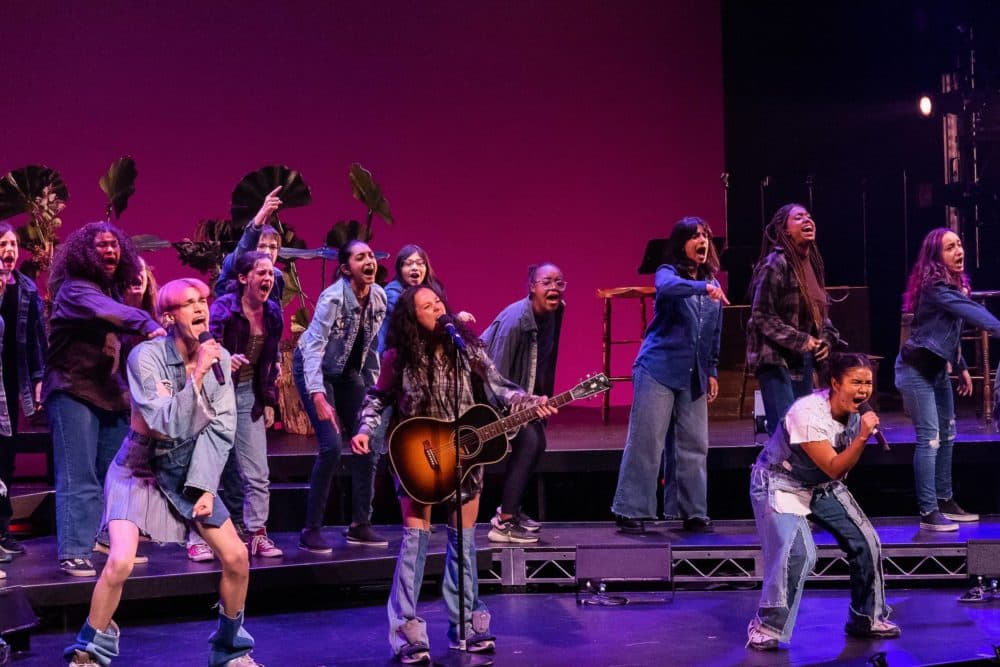 In the foreground, left to right, Luke Ferrari as Possible, YDE as Sophia, and Paravi Das as Forte with members of the Boston Children’s Chorus in "WILD: A Musical Becoming." (Courtesy Maggie Hall/Nile Scott Studios)