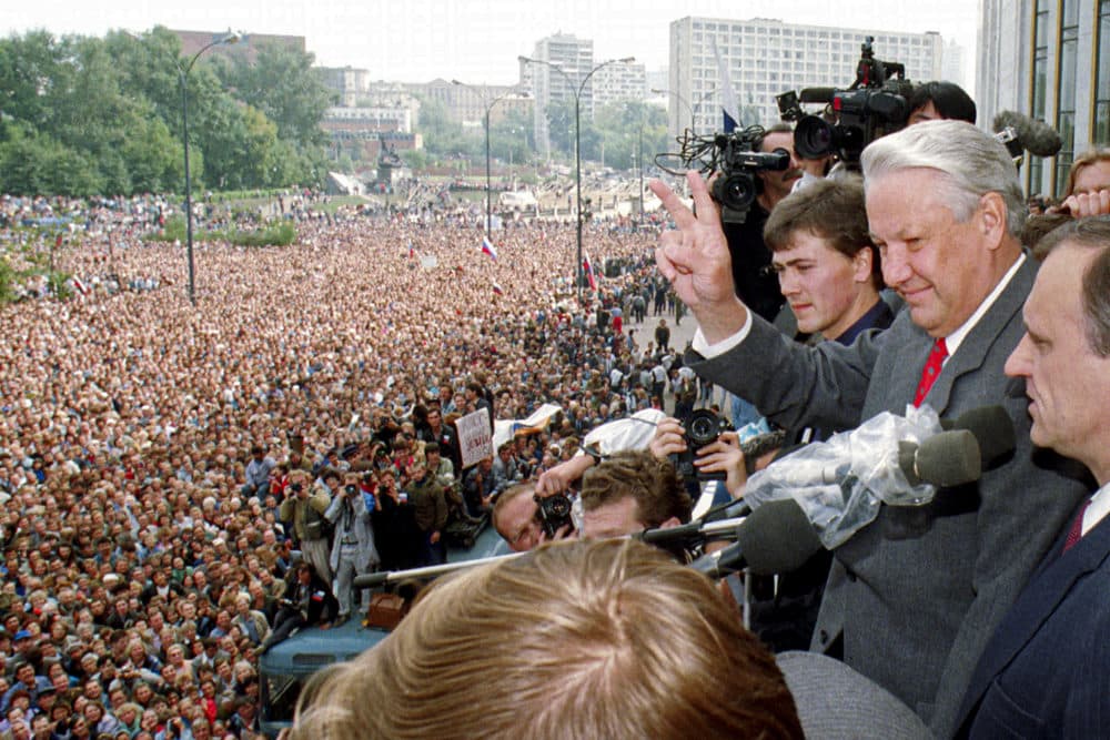 Aug. 22, 1991: Russian Republic President Boris Yeltsin (second right) makes a V-sign to thousands of Muscovites, as his top associate Gennady Burbulis (right) stands near during a rally to celebrate the failed military coup in Moscow, Russia. When a group of top Communist officials ousted Soviet leader Mikhail Gorbachev 30 years ago and flooded Moscow with tanks, the world held its breath. But the August 1991 coup collapsed in just three days, precipitating the breakup of the Soviet Union that plotters said they were trying to prevent. (Alexander Zemlianichenko/AP)