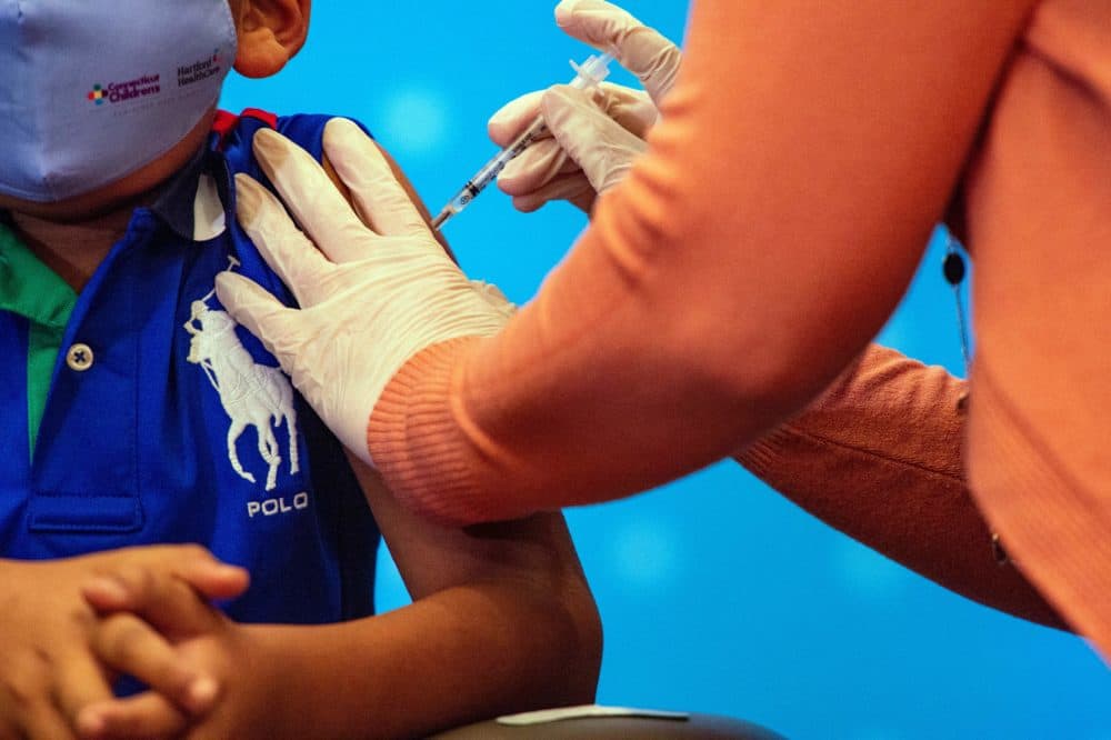 A 6 year old child receives the Pfizer-BioNTech Covid-19 Vaccine for 5-11 year old kids at Hartford Hospital in Hartford, Connecticut on Nov. 2, 2021. (Joseph Prezioso/AFP via Getty Images)