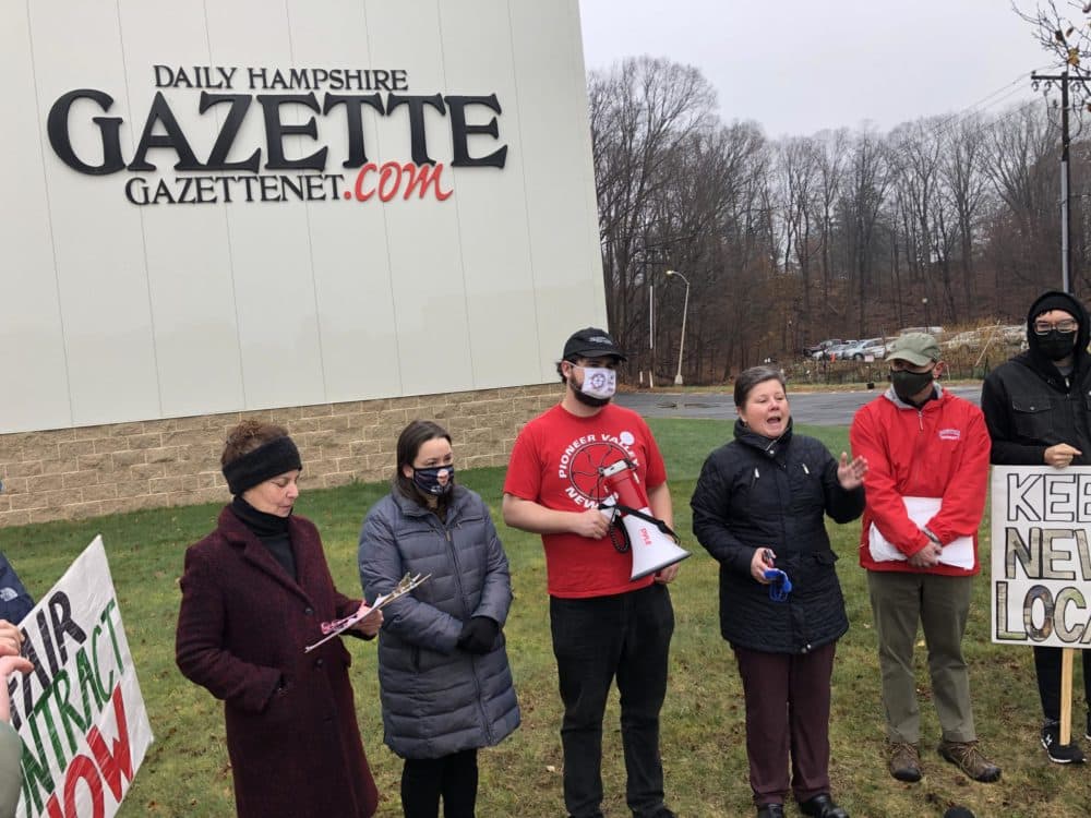 Massachusetts State Sen. Jo Comerford, who writes a monthly column for the Daily Hampshire Gazette, speaks outside the paper's headquarters in Northampton. (Alden Bourne/NEPM)