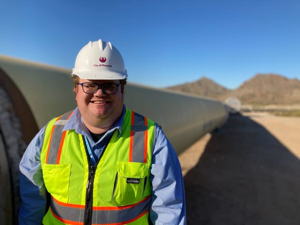 City of Phoenix engineer Clayton Freed stands next to 66-inch steel and concrete pipes. The new $280 million Phoenix Drought Pipeline will make sure 400,000 residents will have water if the Colorado River levels drop too low. (Peter O'Dowd/Here & Now)