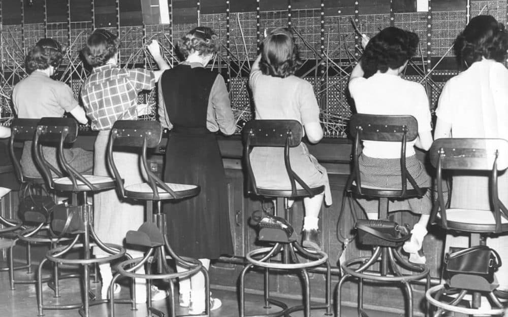 Operators have always been a fashionable lot. Note the bobby sox and saddle shoes. c. 1951. (Courtesy The Telecommunications History Group, Inc.
via Maine Public)