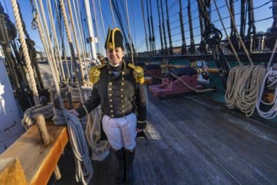 Cmdr. Billie J. Farrell standing on the deck of the USS Constitution in Boston. (Jesse Costa/WBUR)