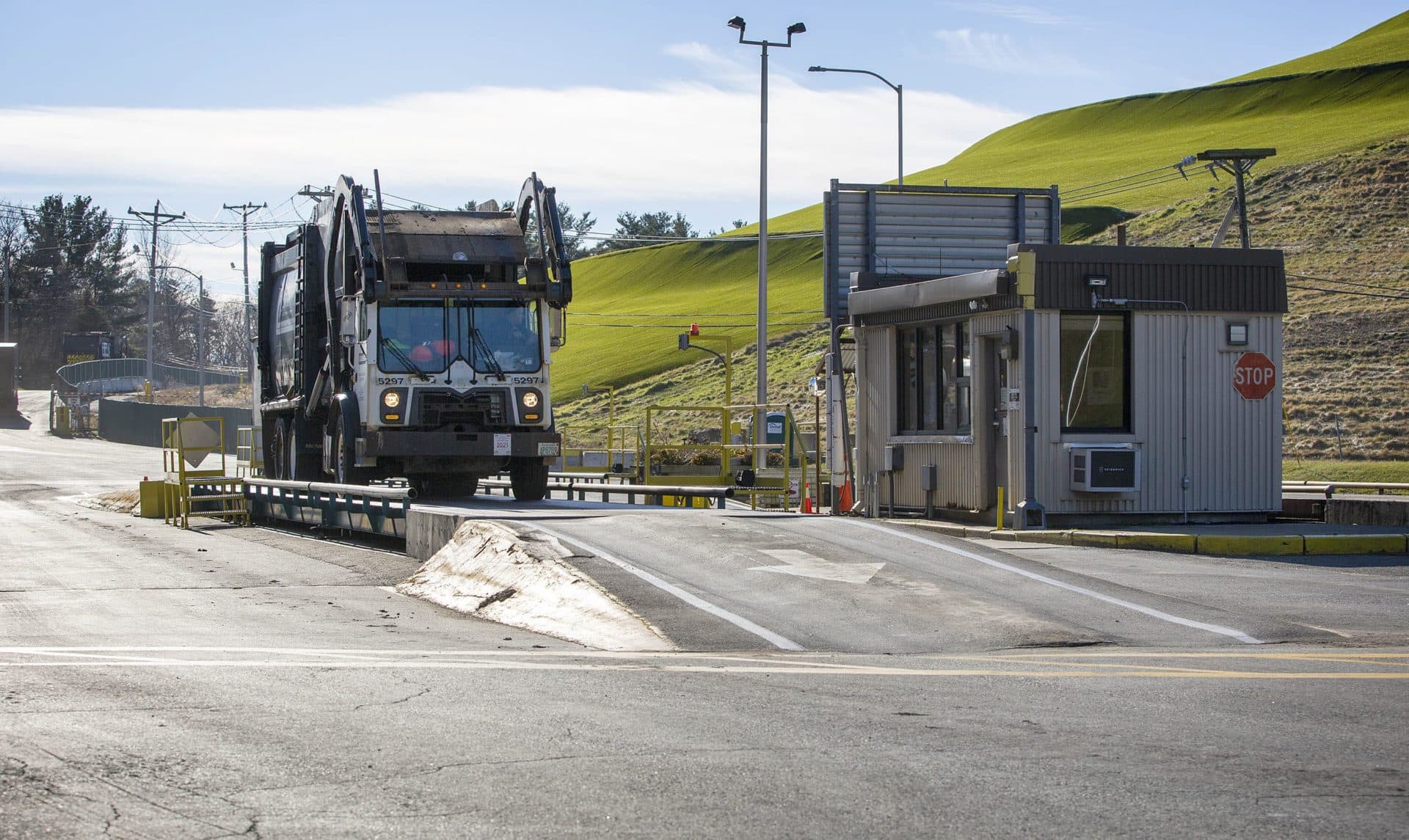 A garbage truck weighs in before dropping off its load of garbage at Covanta's Haverhill waste facility. (Robin Lubbock/WBUR)