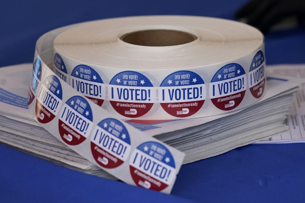 "I voted" stickers in English, Spanish and Creole available at an official ballot drop box location for vote-by-mail ballots for the general election on Nov. 3, at the Miami-Dade County Elections Department, on Oct. 14, 2020, in Doral, Fla. (Lynne Sladky/AP)