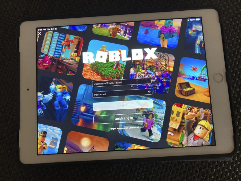 The gaming platform Roblox is displayed on a table. (Leon Keith/AP)