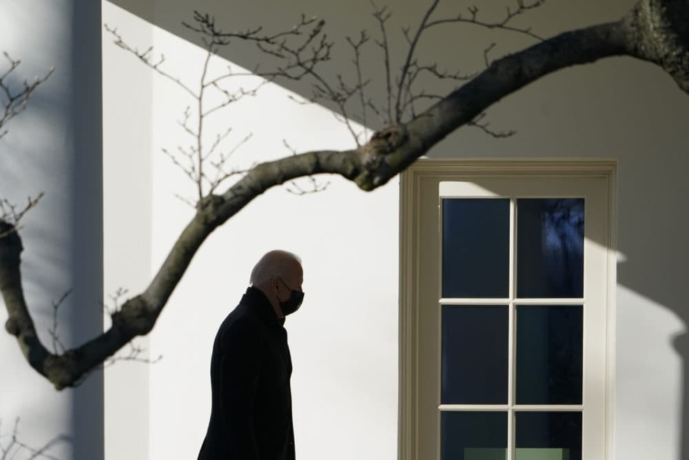 President Joe Biden walks to the Oval Office of the White House after stepping off Marine One on Jan. 10, 2022, in Washington. (Patrick Semansky/AP)