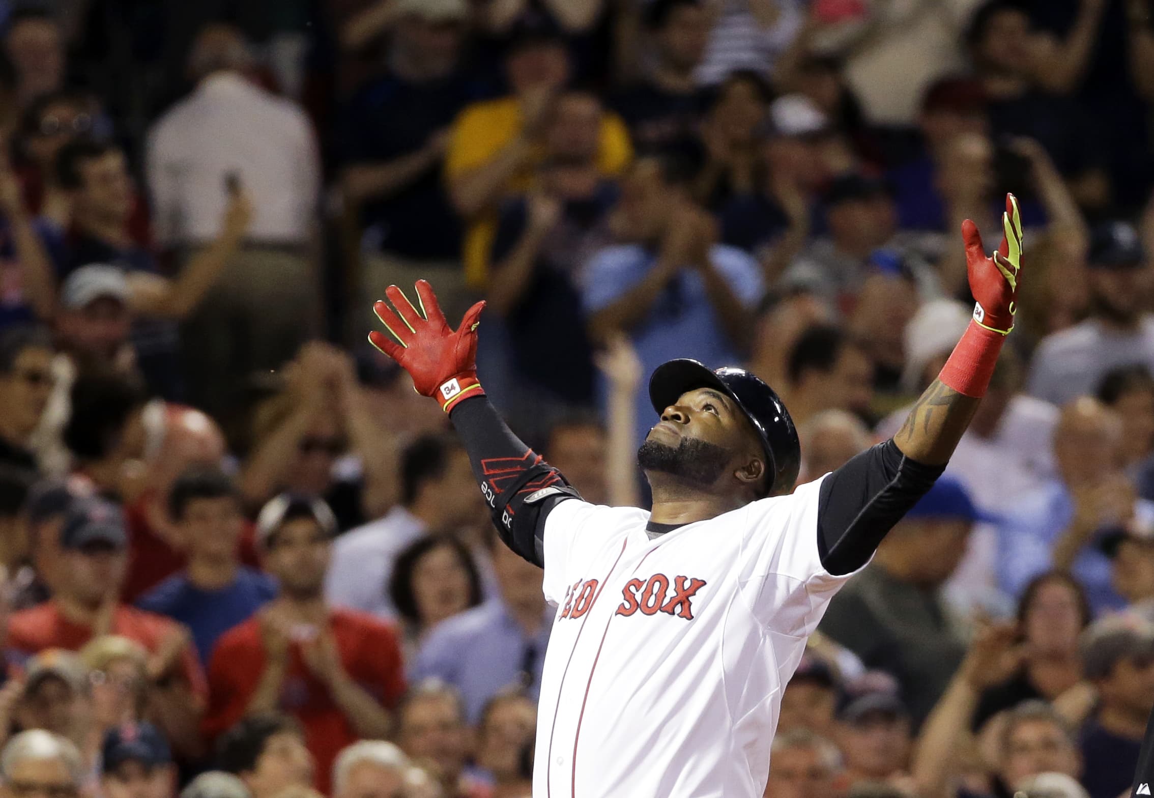 Boston Red Sox designated hitter David Ortiz reacts as he crosses home plate after hitting a two-run home run at Fenway Park in 2015(Elise Amendola/AP)