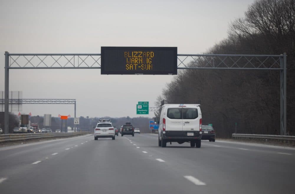 A Department of Transportation information sign on Route 95 in Topsfield warning drivers of the storm coming on Saturday. (Jesse Costa/WBUR)