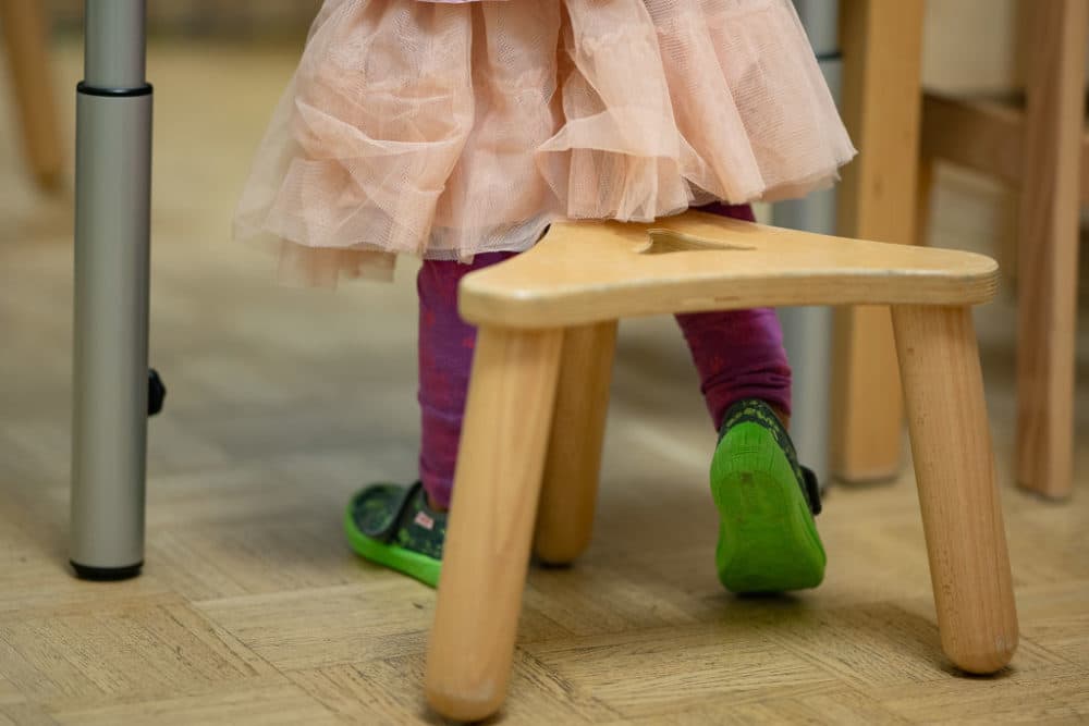 A girl stands at a table in a daycare center in Lower Saxony, Göttingen. There is a shortage of skilled workers in daycare centers.  (Swen Pförtner/picture alliance via Getty Images)