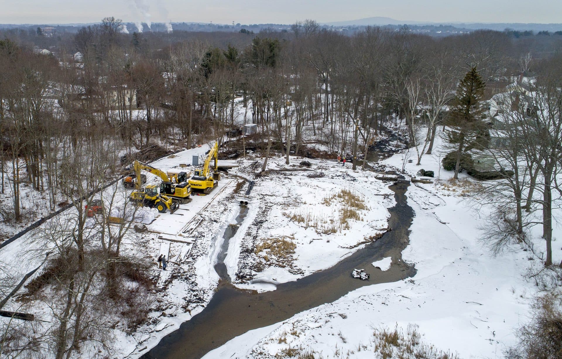 Traphole Brook flows up the image and across the dam at the right side of the photo. The demolition team dug the smaller channel that runs to the left to divert the brook in order to remove the dam. (Robin Lubbock/WBUR)