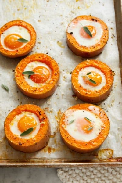Baked eggs in butternut squash rings from "The Fresh Eggs Daily Cookbook" by Lisa Steele. (Tina Rupp)