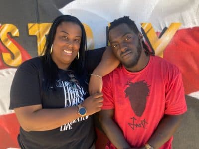 Gizette Knight (left), CEO of the Shining Light Foundation, with artist Giovannie Dixon in Phoenix. (Peter O'Dowd/Here & Now)